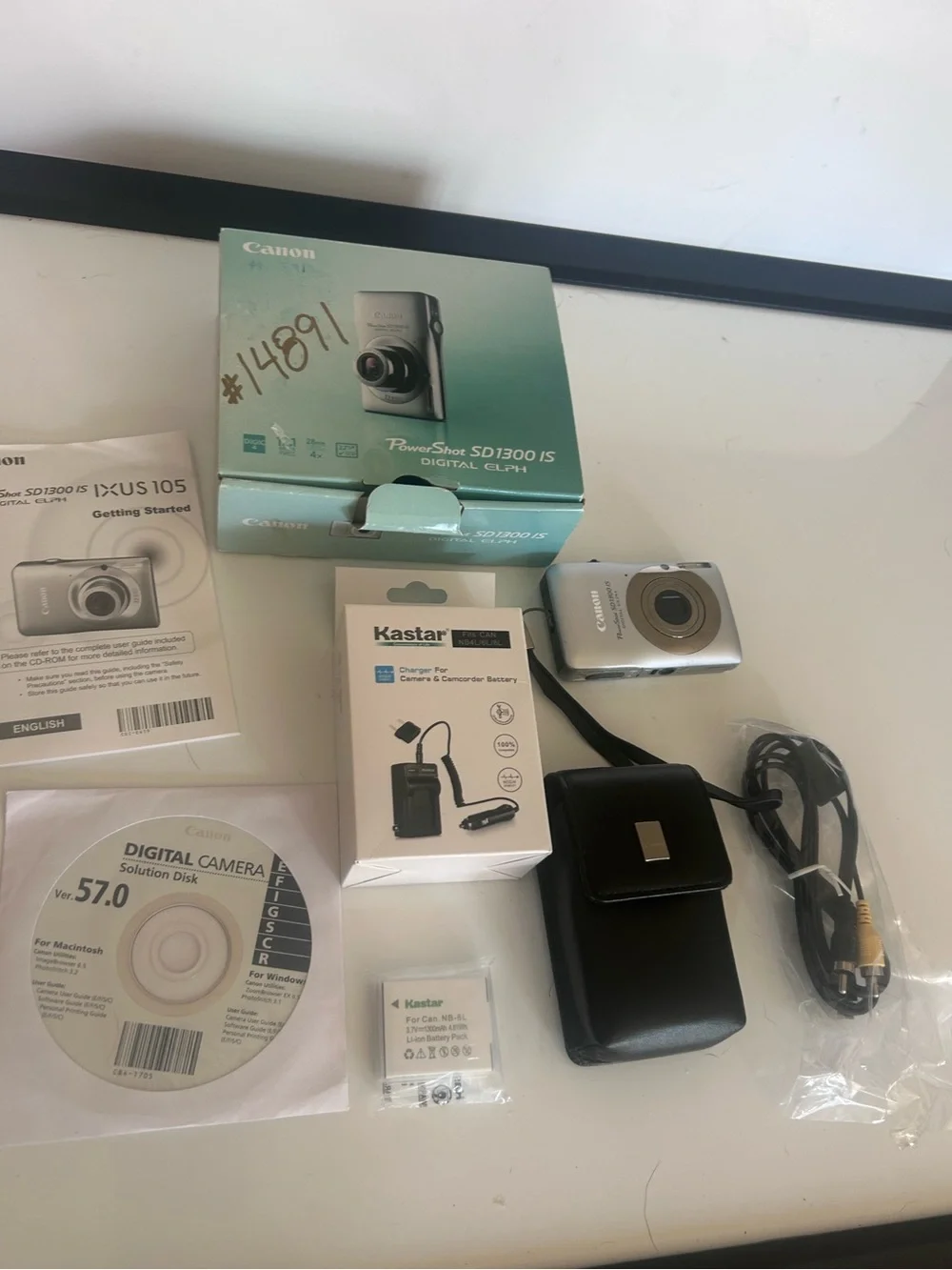 Canon Digital ELPH SD1300 IS 12.1MP Camera - W/ Charger, Software 2 Batteries